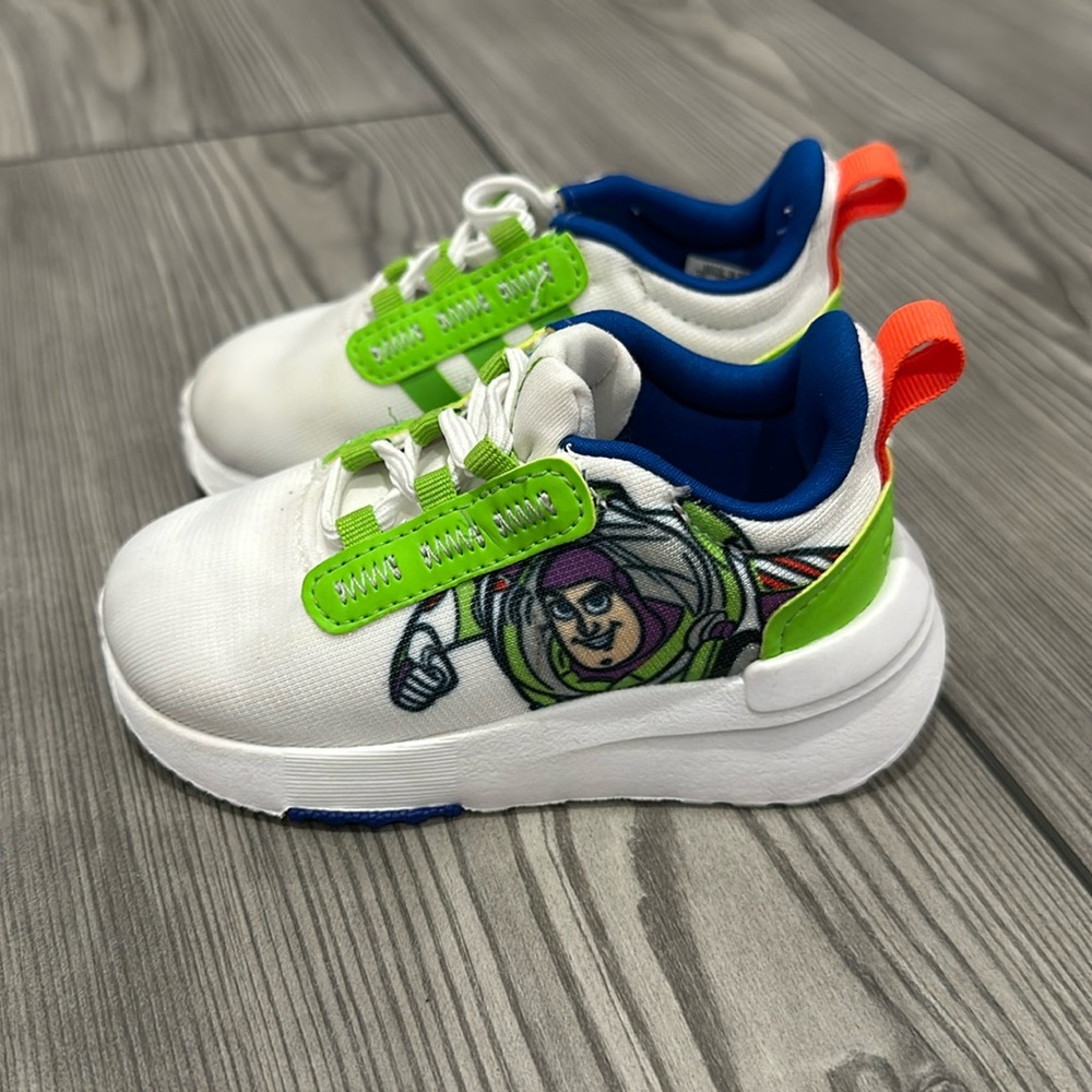 Adidas Buzz Lightyear tennis shoes. Size 5K. Great condition.